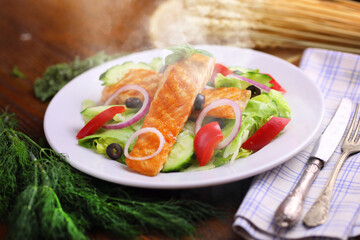 Delicious grilled salmon fillet with vegetables
