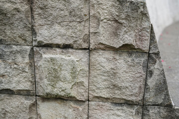 exposed bricks are used for walls in the garden of the house