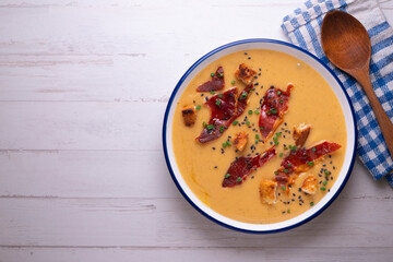 Tomato soup with crispy serrano ham.