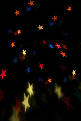 starry light patterns against black background