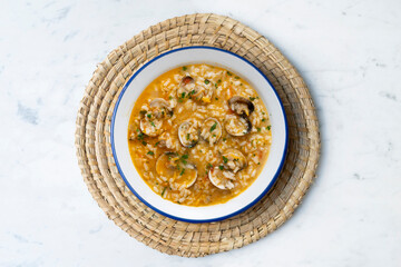 Rice soup with clams. Typical tapas recipe in a seaside town in Spain.