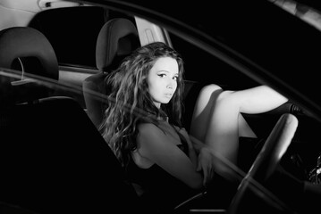 Fototapeta na wymiar Female in night car
