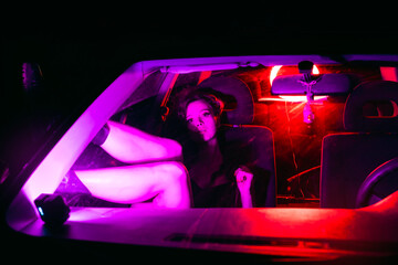 Female in night car