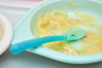 Bowl with vegetable puree for baby on table