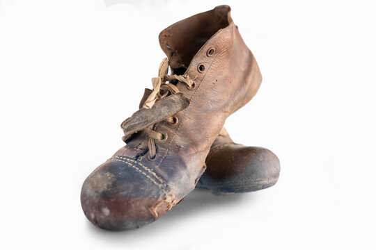 Close Up Of Old Soccer Boots With White Background