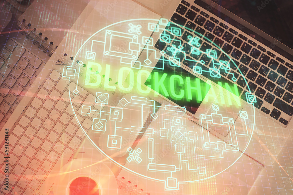 Poster blockchain theme hologram drawings over computer on the desktop background. top view. double exposur