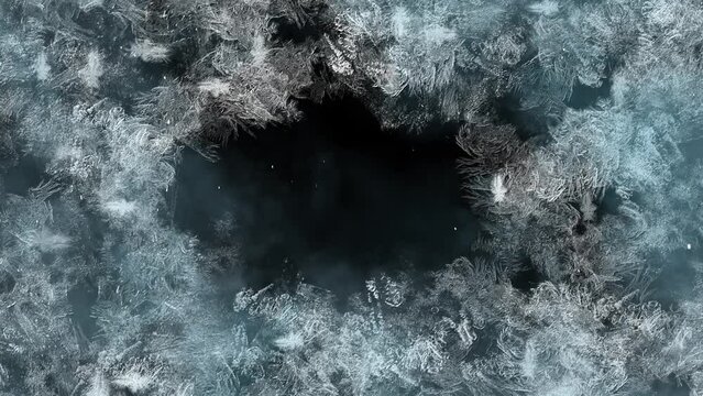 Abstract animation of the appearance of patterns on glass from frost
