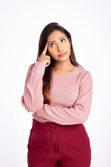 Worried young woman thinking on white background.