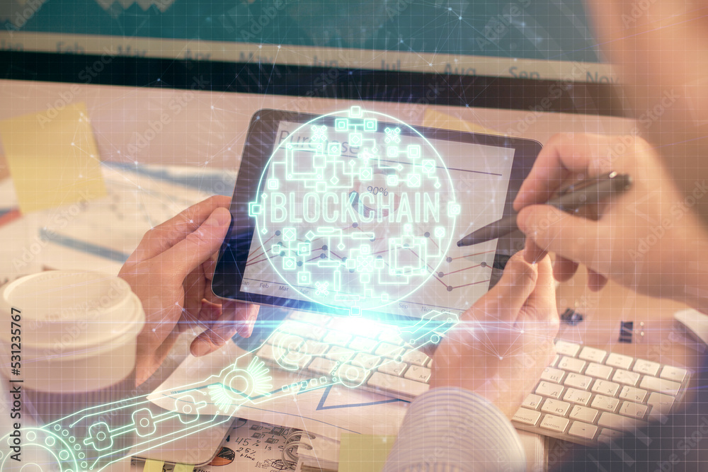 Aufkleber Double exposure of man's hands holding and using a phone and crypto currency blockchain theme drawing.