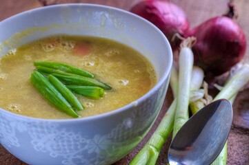 bowl of vegetable soup with vegetables