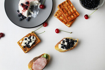 still life top view breakfast of Belgian waffle cheese and berries on a plate. Healthy delicious proper breakfast. Healthy food