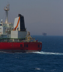 A merchant ship underway at sea in calm weather