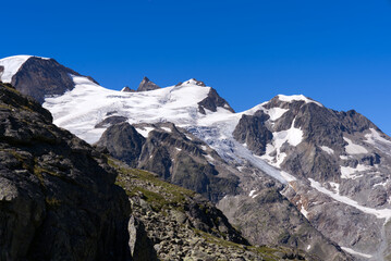 Fototapeta na wymiar Beautiful scenic view of Stone Glacier at Swiss mountain pass Sustenpass on a sunny summer day. Photo taken July 13th, 2022, Susten Pass, Switzerland.