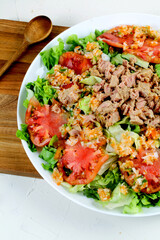 Garden salad with tomato lettuce and tuna