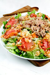 Garden salad with tomato lettuce and tuna
