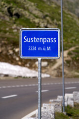 Road sign at Swiss mountain pass Sustenpass 2224 Meters above sea level on a sunny summer day. Photo taken July 13th, 2022, Susten Pass, Switzerland.