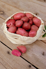 purple potatoes crop close-up selective soft focus, organic vegetables