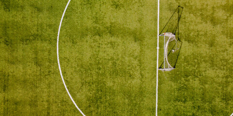 Soccer field in the countryside, aerial view from drone