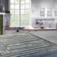 Desk of free space and kitchen interior. 