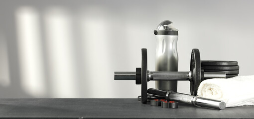 Desk of free space and gym interior. 