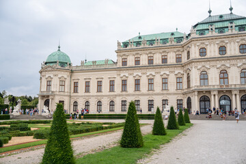 Fototapeta na wymiar Vienna, Austria - August 20, 2022: Tourists at Belvedere Castle and Gardens in summer season