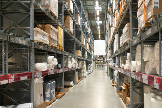 Goods and items on the shelves of a large modern warehouse