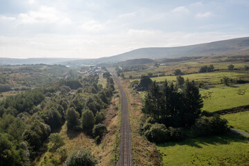 Obraz premium Aerial view above a Railroad Railway Track in South Wales