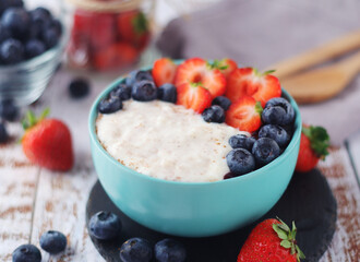 Milk rice with berries ready for breakfast