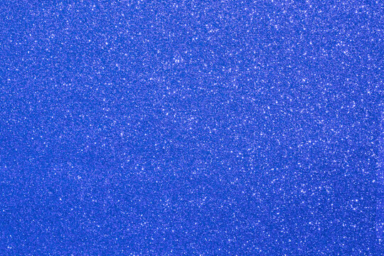 Navy blue silver gilter background bokeh.