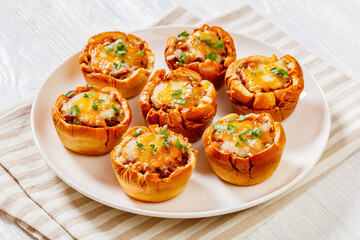 sloppy joe cups on white plate, top view