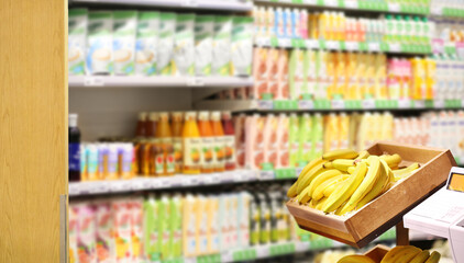 Choosing a dairy products at supermarket.Grocery stores .blurred background