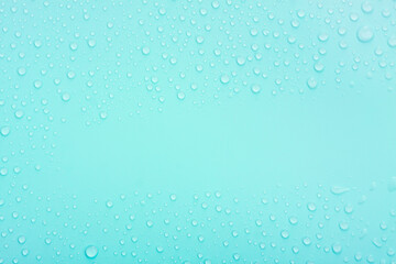 Water drops on blue pastel color background