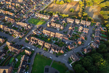 Top down aerial view of houses and streets in a residential area UK New Build Estate Agent House Prices 2022