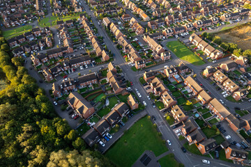 Top down aerial view of houses and streets in a residential area UK New Build Estate Agent House...