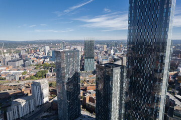 Manchester City Centre Drone Aerial View Above Building Work Skyline Construction Blue Sky Summer Beetham Tower Deansgate Square Glass Towers.