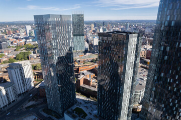 Manchester City Centre Drone Aerial View Above Building Work Skyline Construction Blue Sky Summer Beetham Tower Deansgate Square Glass Towers.