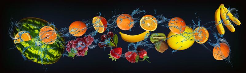 Panorama with fruits in water - juicy orange, banana, melon, kiwi, strawberry, grapes, watermelon...