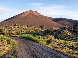 Lava fields road to the Eldfell volcano, Heimaey, Vestmannaeyjar islands, Iceland. Its 1973...