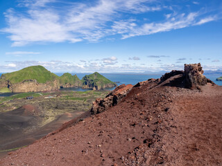 View of Heimaey island from the top of the edge of the Eldfell volcano caldera, Heimaey,...