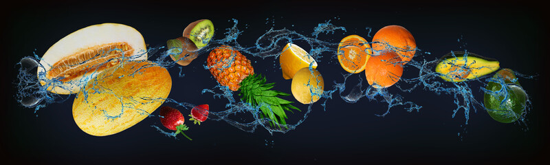 Panorama with fruits in water - juicy avocado, orange, lemon, pineapple, kiwi, strawberry, melon...