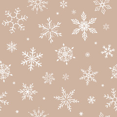 Seamless vector pattern with snowflakes. Beige drawn illustration background. For fabrics, wrapping paper, wallpapers.
