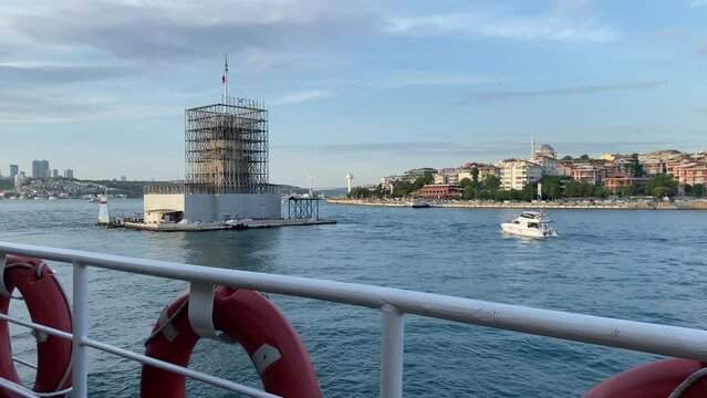 Uskudar, Istanbul, Turkey. June 25, 2022. Maiden's Tower, one of the historical symbols of Istanbul, has a scaffolding built around it for restoration. 