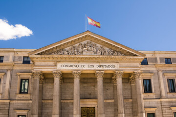 Fototapeta na wymiar Detail of the pediment of the Palace of Deputies in Madrid