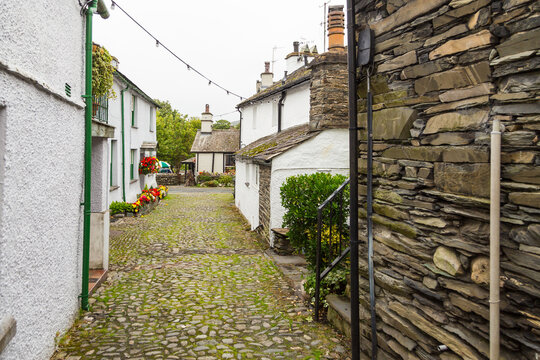 Facade of a white buildings in the village of Hawkshead, England, UK.
