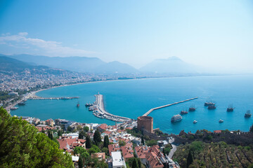 Landscape with marina and Kizil Kule tower in Alanya peninsula, Antalya district, Turkey, Asia....