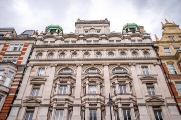 Fototapeta na wymiar Facades of grand building on in London, the UK's grand capital.