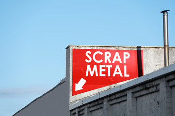 Scrap metal recycling sign at visitors entrance