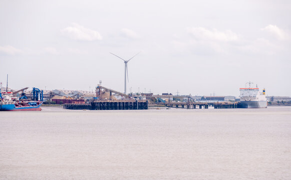 London, England, UK - September 04, 2022: Dagenham wind turbines and Dagenham, Storage facility
