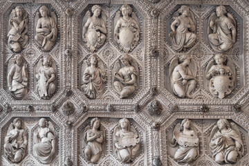 Detail of the religious stone sculptures on the portal of Dijon cathedral