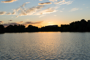 sunset over the river,  Baneasa Lake, Matelotilor Alley, Bucharest City, Romania 
